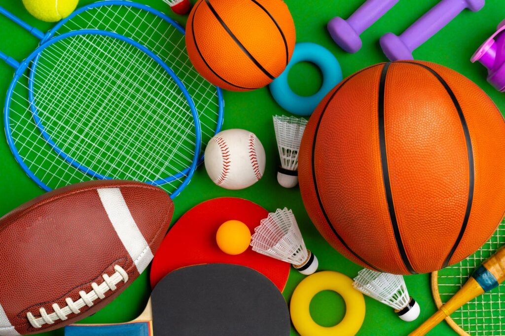 Outdoor games and equipment include a composition of various sport equipment for fitness and games. Close up.