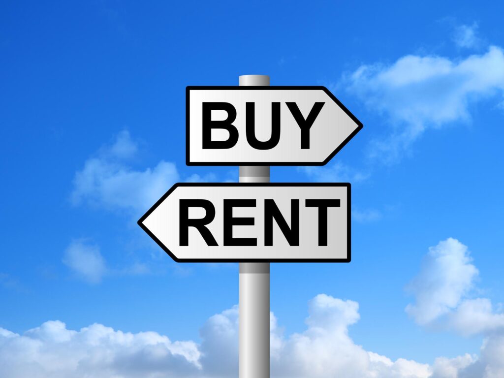 Rent an apartment or buy a home? Buy or rent on signpost against blue sky