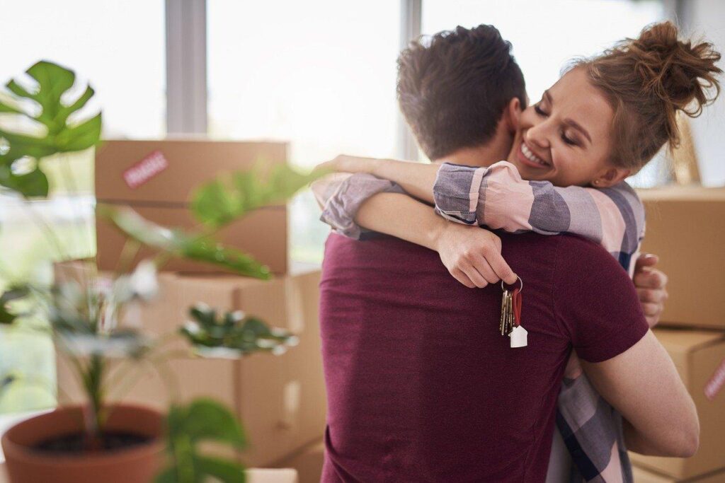 Couple in their new home as first-time homebuyers