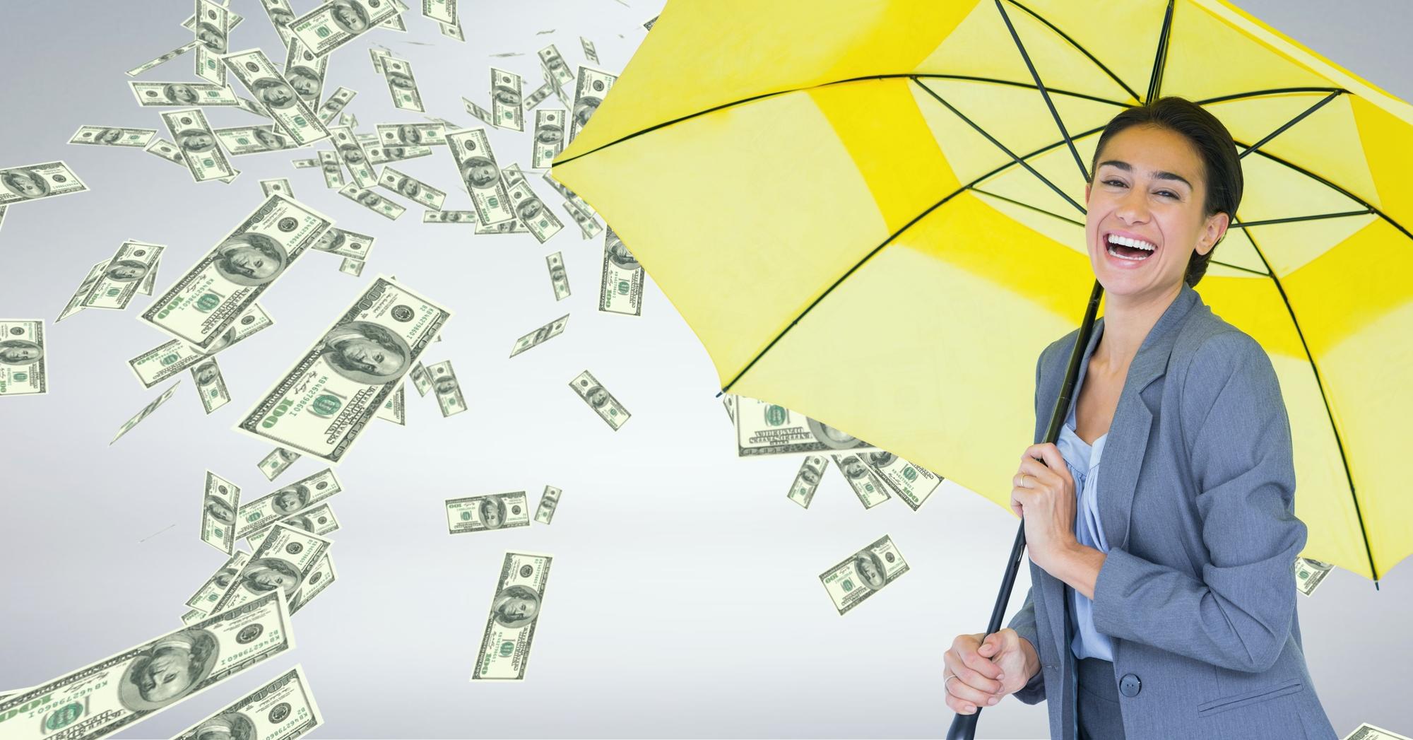 tax benefits of owning a home with Digital composite of Happy business woman under umbrella with money rain against grey background